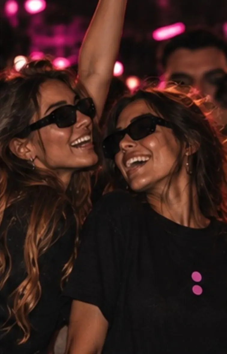 Two friends wearing the black MINUTE:61 T-shirt